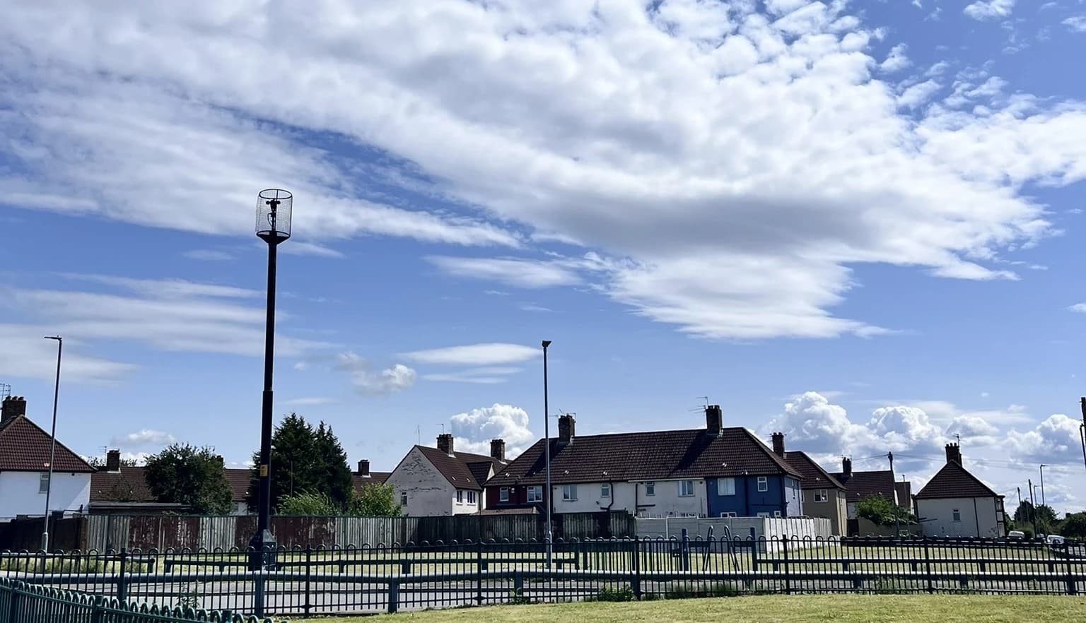 A picture of blue skies above housing in Hillside North Huyton.