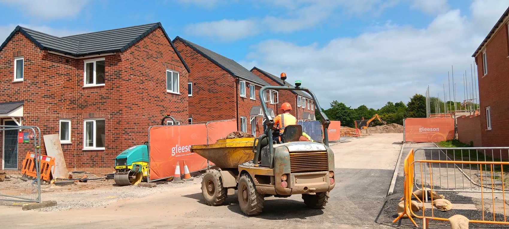 A picture of some new developed houses on a Gleeson developed site as part of Phase 2, displaying the New Homes Quality Code flag