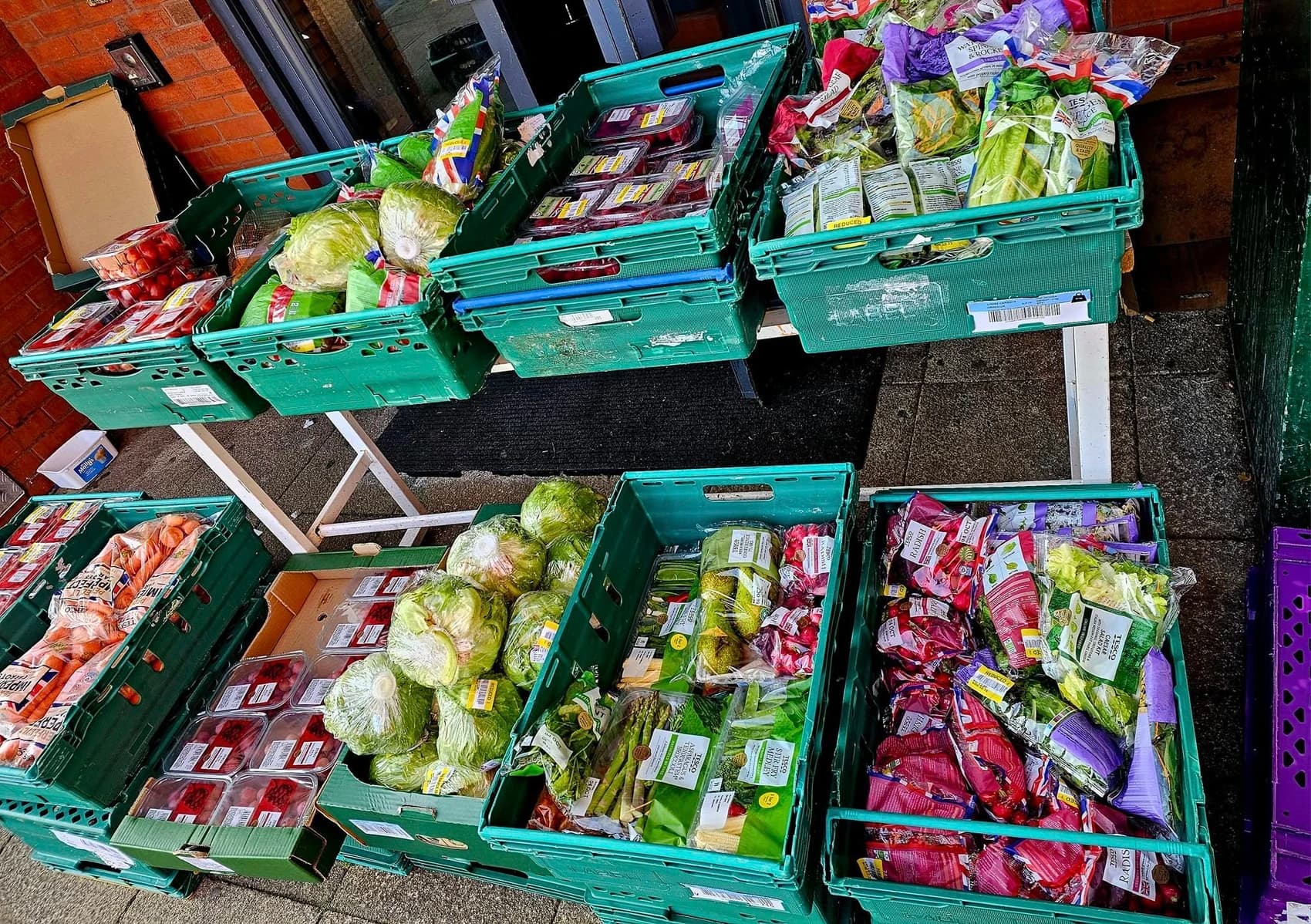 A picture of fresh fruit and vegetables in crates ready for the Grub Hub/Food club