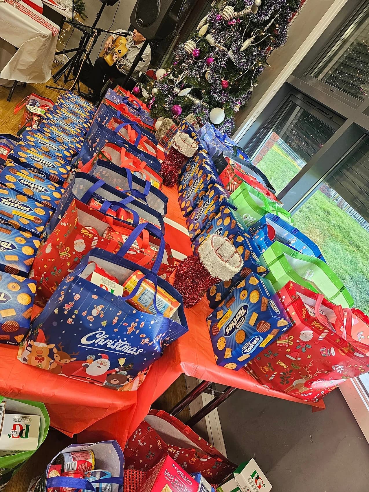 A picture of Christmas presents and biscuits.